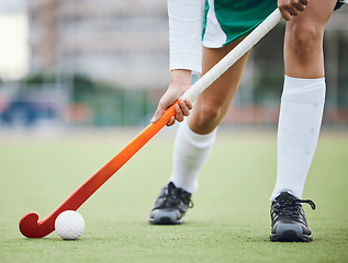 Image showing Woman athlete, hockey and field with exercise for game goal training or running, workout on grass turf. Feet of sports person, fitness competition or strong cardio health, challenge in fast play