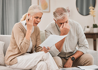 Image showing Married, couple and together with documents in frustration for finances, vacation or retirement at home. Elderly, man and woman on sofa with paperwork with bad news for plan, investments or budget