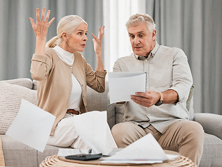 Image showing Debt, old couple with documents and stress in home, mortgage payment and retirement funding crisis. Financial budget, senior man and woman on sofa with anxiety for bills, life insurance and taxes.