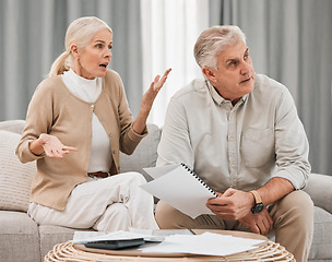 Image showing Bills, old couple with documents and stress in home, mortgage payment and retirement funding crisis. Financial budget, senior man and woman on sofa with anxiety for debt, life insurance and taxes.