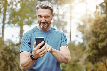 Image showing Man, phone and outdoor with exercise clothes or smile for communication or conversation in sport. Male, health and smartphone for cardio app and workout for strong, athlete or happy in nature
