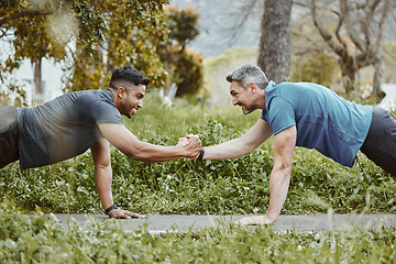 Image showing Fitness, nature and men doing push up in team for arm strength or muscle development in park. Sports, workout handshake and male athlete friends do exercise for training together in outdoor garden.