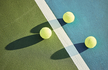 Image showing Ball, tennis court and turf for athlete or game for fitness or health as athlete or workout, match or serve. Sports, above and outdoor for energy or cardio in summer for exercise or tournament in sun