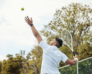 Image showing Man, tennis and serve with fitness on court and start game, sports and athlete, performance and competition. Health, energy and professional player on outdoor turf, exercise and racket during match