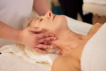 Image showing Relax, face massage and senior woman at a spa for health, wellness and anti aging skincare treatment. Calm, beauty and elderly female person in retirement with wrinkles face routine at natural salon.