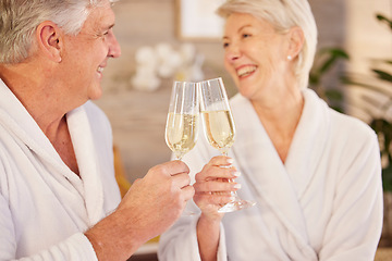 Image showing Senior couple, hotel and champagne toast for romance, luxury vacation and love in retirement. Happy, holiday and elderly man and woman with a cheers, alcohol and drink together for a break or care