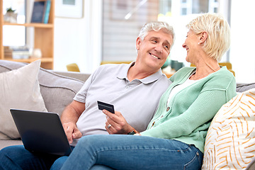 Image showing Laptop, senior or happy couple online shopping with credit card for digital product with discount code. Smile, promo or mature people with financial payment to buy on sale on fintech website at home