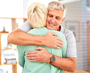 Image showing Home, love or senior couple hug in for romance, care or bonding together in a healthy connection. Happy man, mature woman or romantic people embrace to celebrate marriage anniversary with a smile