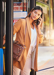 Image showing Business, woman or phone call at bus stop for travel or location with public transport for commute in urban city. Professional, corporate or person with smartphone and chat, talking or transportation