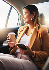 Image showing Businesswoman, phone and coffee in car for travel to work with smile in happiness, alone and profile. Young, person and employee with commute to office in taxi, backseat and sitting to look at street