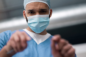 Image showing Portrait, doctor and man in surgery in operating room in scrubs with face, healthcare and pov. Medical professional, job and confident in medicine for treatment, illness or health in hospital