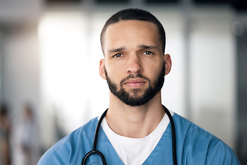 Image showing Portrait of man, surgeon or doctor in hospital with ppe, healthcare worker with confidence in medicine and help. Health expert, medical professional and serious face of nurse in clinic for surgery.
