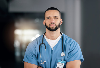 Image showing Serious, nurse and portrait of man in hospital for healthcare, wellness or nursing career. Face of surgeon, confident medical professional worker and employee, therapist or expert physician in Brazil