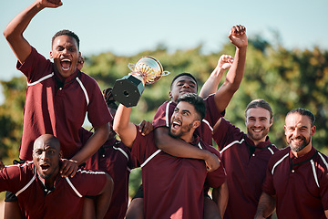 Image showing Sports, winning and team on field for celebration, cheers and excited trophy at competition. Smile, men and teamwork in rugby, happy friends jump with praise, achievement and game success together.