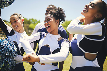 Image showing Cheerleaders, field and team with celebration, game and winner with happiness, motivation and smile. Women, men and group cheering, outdoor or chanting with sports, champion with support and excited