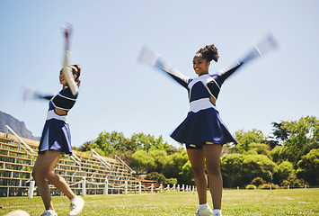Image showing Dance, cheerleading and women on a field for training, teamwork and a performance for a game. Cheerleader, happy and a team with a routine, sports or motivation for an event on school grass together