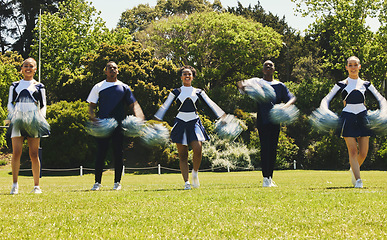 Image showing Motion blur, energy and a cheerleader group of young people outdoor for a training routine or sports event. Motivation, teamwork and diversity with a happy cheer squad on a field together for support