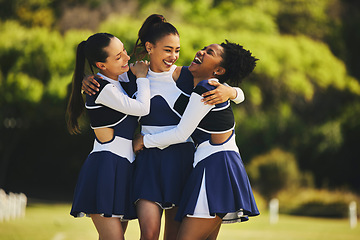 Image showing Teamwork, hug or happy cheerleader with women outdoor in training or sports event together. Celebrate, smile or proud friends or excited cheer squad group on field for support, winning or fitness