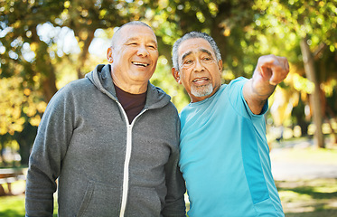 Image showing Outdoor, senior men and pointing with fitness, exercise and health with direction, workout and wellness. Old people, friends and guys in a park, training and pensioner with nature and motivation