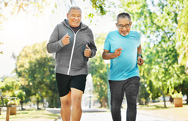 Image showing Senior, men and running for training in road of city for wellness, exercise or workout outdoor with smile. Elderly, people and fitness together in nature or park for health, adventure and happiness