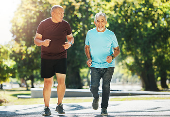 Image showing Elderly, men and running for fitness in road of city for wellness, exercise or workout outdoor with smile. Senior, people and training together in nature or park for health, adventure and happiness