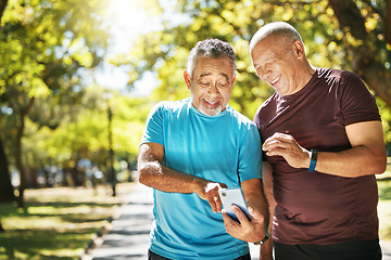 Image showing Social media, men and a phone in a park for fitness, training results and conversation about an app. Happy, communication and senior friends with a mobile to monitor health after exercise or running