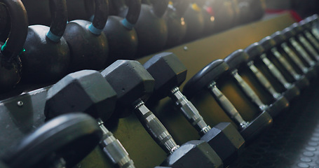 Image showing Dumbbell, weight and close up at gym for fitness sport or wellness workout, training or goals. Exercise membership, workout and muscle power or build as athlete competition, performance or motivation