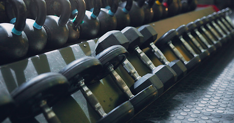 Image showing Dumbbell, weight and close up at gym for strong sport or wellness workout, training or goals. Exercise membership, workout and muscle power or build as athlete competition, performance or motivation