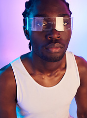 Image showing Man, vr or futuristic sunglasses in portrait for fashion, designer brand and style in studio on a neon background. Face of african person in trendy tech, virtual reality vision and metaverse glasses