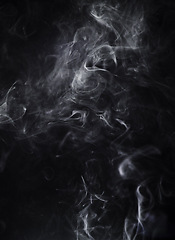 Image showing Smoke, dark background and steam, fog or gas on mockup space wallpaper. Cloud, smog and magic effect on black backdrop of mist with abstract texture, dry ice pattern or vapor of incense moving in air