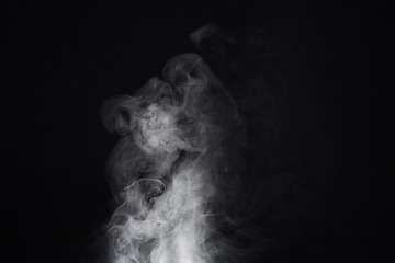 Image showing Smoke, dark background and mist, fog or gas on mockup space wallpaper. Cloud, smog and magic effect on black backdrop of steam with abstract texture, dry ice pattern or vapor of incense moving in air