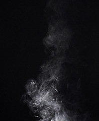 Image showing Smoke, dark background and mist, fog or gas on mockup space wallpaper. Cloud, smog and magic effect on black backdrop of steam with abstract texture, pollution pattern or incense vapor moving in air