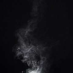 Image showing Smoke, black background and steam, fog or gas on mockup space wallpaper. Cloud, smog and magic effect on dark backdrop of incense with abstract texture, pollution pattern and mist vapor moving in air