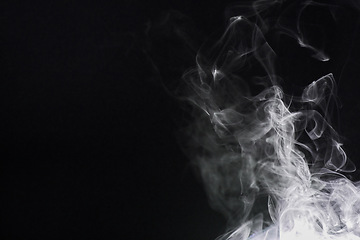 Image showing Smoke, dark background and incense, fog or gas on mockup space wallpaper. Cloud, smog and magic effect on black backdrop of steam with abstract texture, dry ice pattern or vapor of mist moving in air