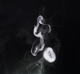 Image showing Smoke, dark background and mist, fog or gas on mockup space wallpaper. Cloud, smog and magic effect on black backdrop of steam with abstract texture, dry ice pattern or vapor of incense moving in air