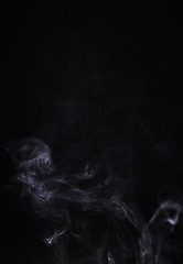 Image showing Smoke, gas or pollution with incense on dark background, fog or mist with vapor and mockup space in studio. Dry ice, pattern and texture with environment, steam and air with black backdrop and smog