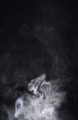 Image showing Smoke, dark background and incense, fog or gas on mockup space wallpaper. Cloud, smog and magic effect on black backdrop of steam with abstract texture, pollution pattern or mist vapor moving in air