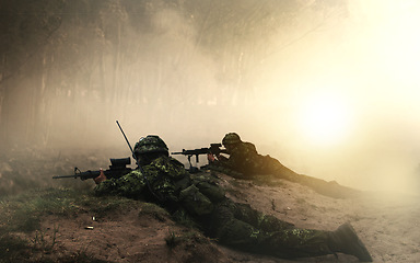 Image showing Military, war and soldier by smoke on ground, battlefield or fight in forest with army uniform, guns and protection. Warzone, warrior and person in camp look at apocalypse in woods for defence duty