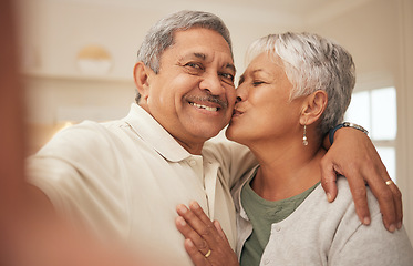 Image showing Selfie, kiss and old couple in home with love, support or portrait of marriage in retirement together. Digital photography, smile on face of happy man and old woman in apartment for social media post