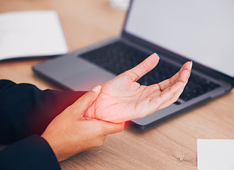 Image showing Wrist, pain and business woman with laptop, mockup or screen in office closeup with injury. Hand, red and lady manager with carpal tunnel, arthritis or osteoporosis, joint and fibromyalgia crisis