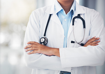 Image showing Person, hands and professional doctor with arms crossed or stethoscope for cardiology or healthcare at hospital. Closeup of confident medical nurse or surgeon expert for health advice or emergency