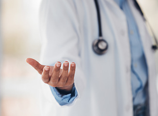 Image showing Hand, healthcare and a doctor with invisible or space advertising for artificial intelligence or metaverse innovation. Medical, future and gesture with a medicine professional closeup in a hospital