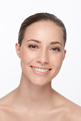 Image showing Woman, smile and studio portrait for beauty or cosmetic results, glow or makeup routine. Female model, face and nude wellness natural look for happiness, white background or clean skin dermatology