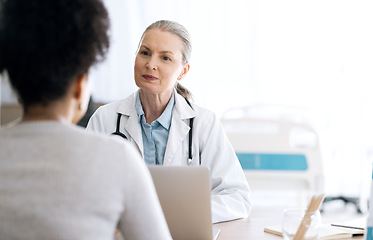 Image showing Woman doctor, medical consultation and computer at hospital with patient discussion and surgery info. Wellness advice, technology and mature professional with healthcare, consulting and talking