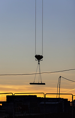 Image showing tall yellow construction crane