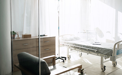 Image showing Empty room in hospital, health insurance and medical support in rehabilitation, healing or recovery. Emergency, surgery and bed in clinic for patient treatment, nursing or bedroom for healthcare plan