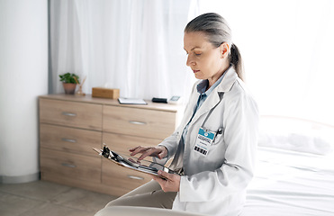 Image showing Healthcare, woman and doctor with tablet on bed for communication, checklist and telehealth at hospital. Professional, employee and person with touchscreen for online consultation and support on web