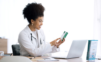 Image showing Woman, doctor and laptop for video call, pills and advice with telehealth, product or package in clinic office. Medic, nurse or pharmacist with box, drugs and happy for consultation with computer