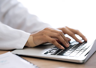 Image showing Closeup, hands and doctor with a laptop, typing and connection with research, network and website info. Person, medical professional and worker with plaster, pc and keyboard with deadline and app