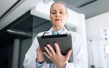 Image showing Woman, doctor and tablet in research, Telehealth or communication for results or networking at hospital. Female person, healthcare or medical surgeon working on technology for online search at clinic